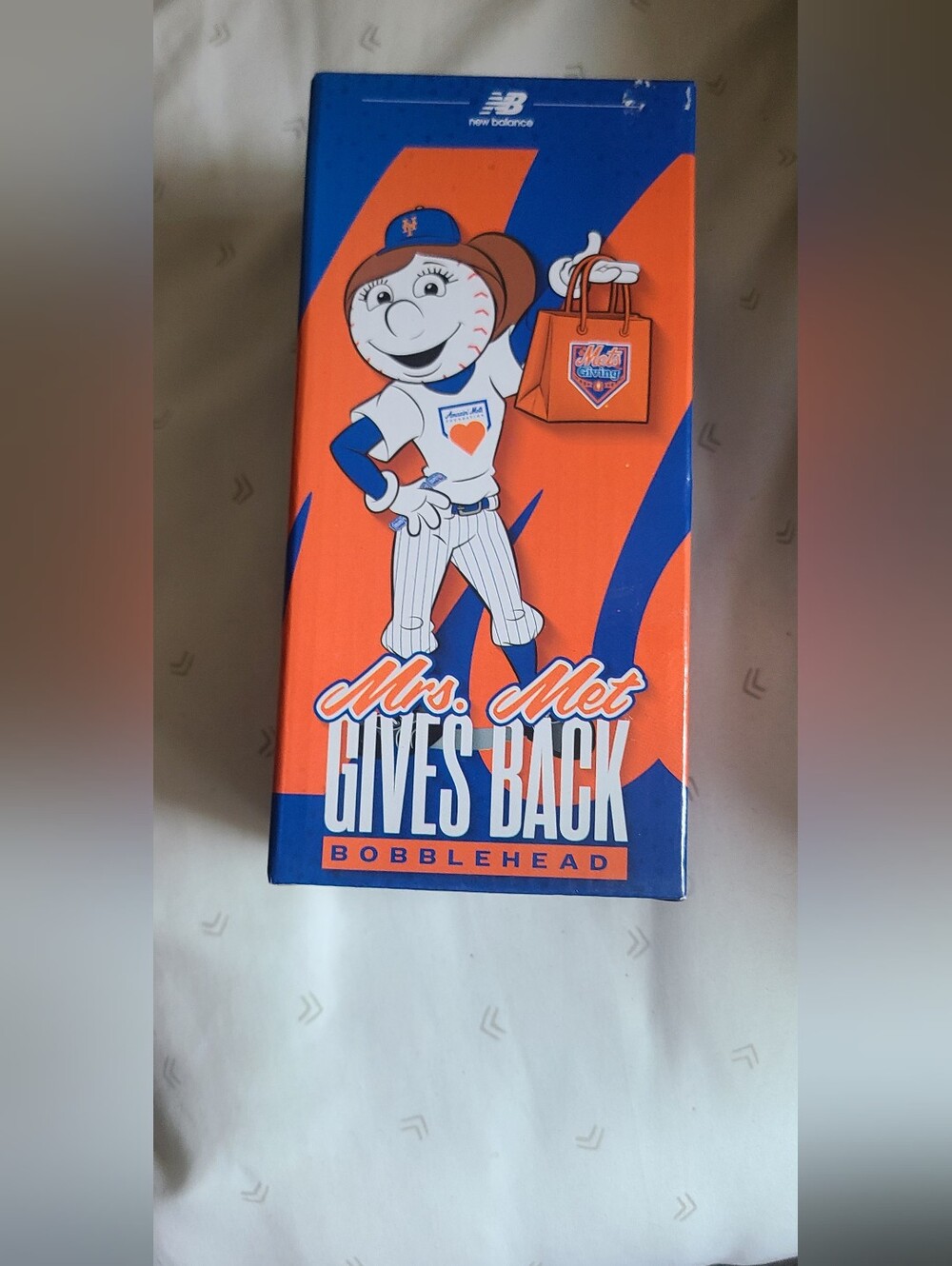 Mrs. Met Gives Back Bobblehead - New Balance - Orange/Blue